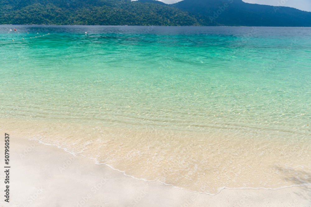 Wall mural Beach and sea view on Lipe island, Satun Province, Thailand, andaman sea where you can watch the sunrise and sunset on the same beach.