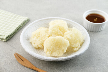 Cireng, a savory snack from West Java, Indonesia, made from tapioca flour and deep-fried, served with a spicy sauce.
