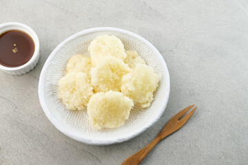 Cireng, a savory snack from West Java, Indonesia, made from tapioca flour and deep-fried, served with a spicy sauce.
