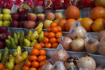 Almaty, Kazakhstan - 03.25.2022 : Sale of various vegetables and fruits at the market stalls.