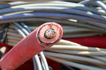 red electric cable for high voltage electricity and you see the inner core of COPPER and other...