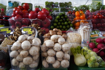 Almaty, Kazakhstan - 03.25.2022 : Sale of various vegetables and fruits at the market stalls.