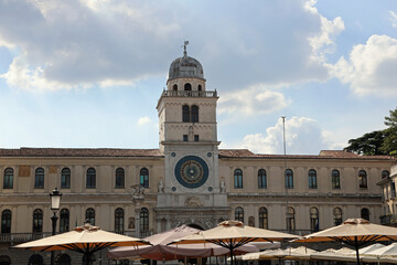 Famous Clock Tower in Padua City in Italy in Europe and market stalls in SIGNORI Square