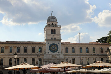 Famous Clock Tower in Padua City in Italy in Europe and market stalls in SIGNORI Square © ChiccoDodiFC