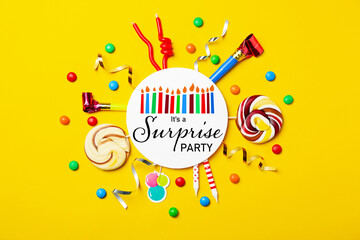Flat lay composition with different items for surprise party on yellow background