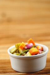 Selected Focus Acar, Side Dish for Chicken, Meat, or Martabak Dish. Diced Carrot and Cucumber with Green Chilli and Shallot, Mix with Vinegar, Sugar, Salt.
