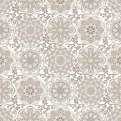 Seamless pattern, hand drawn, vector. Simple, beige colour, mandala pattern, white background.