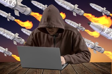 Hacker, propagandist launches fake news. Information war, hybrid war, war in the media space. Cyber...