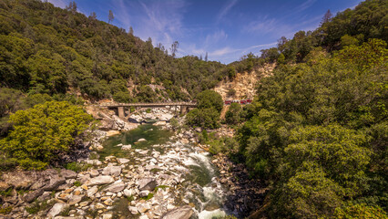 Fototapeta na wymiar The Yuba River with historic bridges in California, USA.