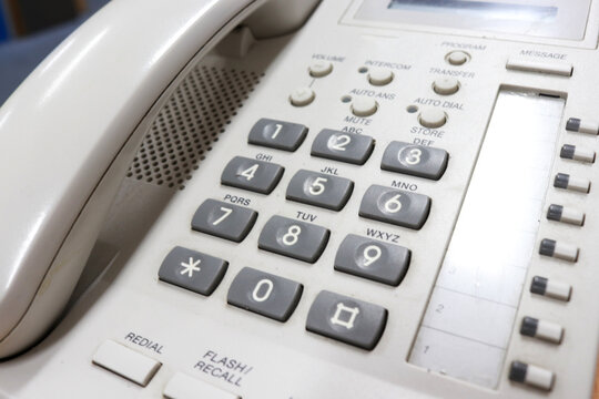 Number keys on the phone to call someone, or for emergency calls. Phones with cables are usually in the office