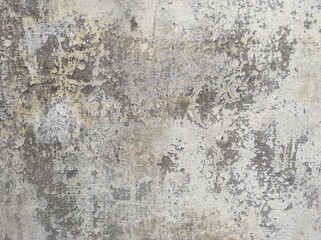 Wall fragment with scratches and cracks.Grunge Grey wall with peeling paint,close-up background photo texture.Old distressed wall backdrop, grunge background or texture.Old wall background.Background.
