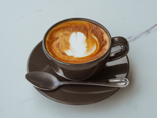 Hot latte in a warm atmosphere