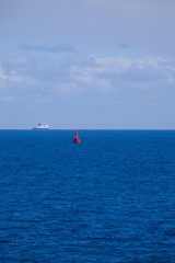 Passenger and cargo roro ferries sailing at sea in North Sea canal between France and England on...