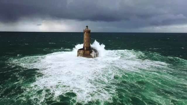 Lighthouse in an ocean storm in Bretagne, France