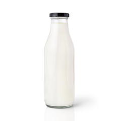 Milk in glass bottle on a white background, cow milk