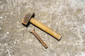 stone mason hammer and chisel