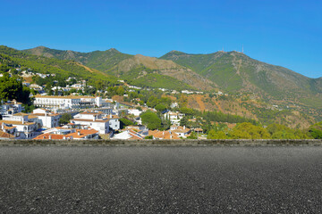 Fototapeta na wymiar Street view with the city on the hill
