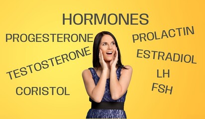 Hormones imbalance. Stressed young woman posing on a background