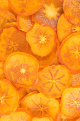 dried persimmon chips, background, close-up