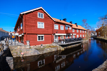 Fototapeta na wymiar Colorful wooden houses in Eksjö town in Sweden
