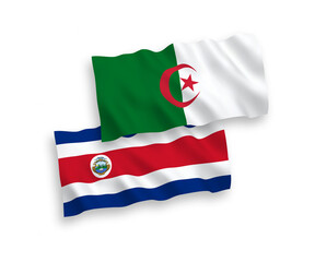National vector fabric wave flags of Republic of Costa Rica and Algeria isolated on white background. 1 to 2 proportion.