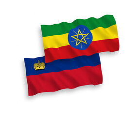 National vector fabric wave flags of Liechtenstein and Ethiopia isolated on white background. 1 to 2 proportion.