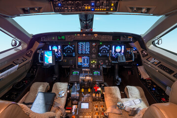 Cockpit interior of a Gulfstream IV, night mode - stock photo