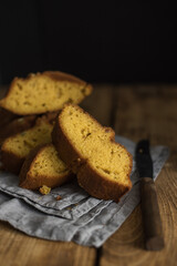 Autumn pumpkin cake. Close-up slices on a rustic wooden table.