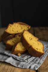 Autumn pumpkin cake. Close-up slices on a rustic wooden table.