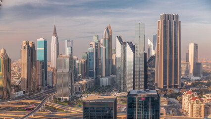 Panorama of Dubai Financial Center district with tall skyscrapers timelapse.
