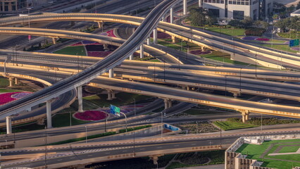 Highway intersection and overpass of Dubai downtown aerial timelapse.