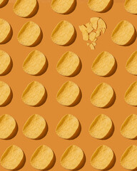 pattern with chips on a yellow background. crispy snacks on a yellow table. chips for beer. yellow chips on a yellow background