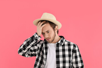 Concept of people, young man on pink background