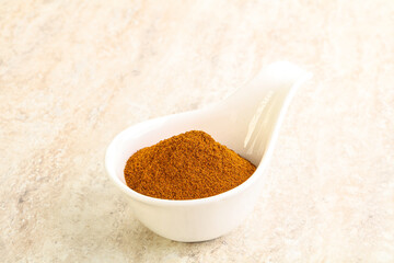 Dry Paprika powder in the bowl