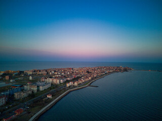 View from a height above the town of Pomorie with houses and streets washed by the Black Sea in Bulgaria