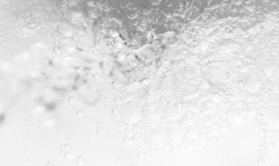 Transparent clear white water surface texture with ripples, splashes and bubbles. Aosmetic...
