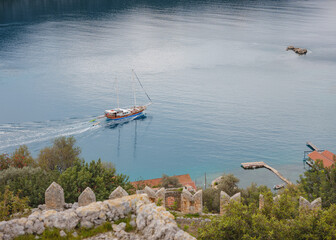 Travel and tourist attractions at Kekova island, Turkey. beautiful view of seascape from Kalekoy Village, Demre, View with boat and islands in sea