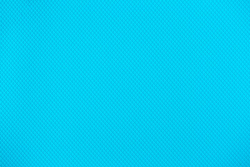 Blue background of decorative plaster with abstract spots. Unusual texture of this wall with beautiful patterns, creative surface background. Finishing coating for building cladding.