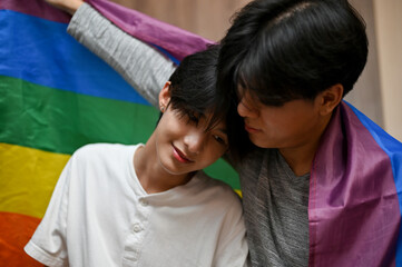 Obraz premium Romantic asian teenage gay men couple, a man put his head on his boyfriend shoulder
