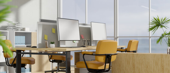 Modern office workplace interior design with computer, office supplies and decor.