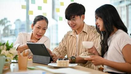 A group of business people working together in the office