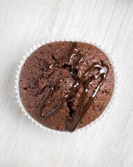 Little chocolate muffins in white background