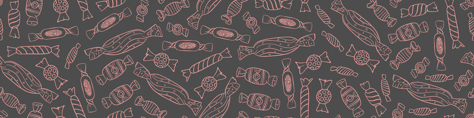Seamless horizontal border with hand drawn sweets on gray background. Outline doodle candies in wrappers. Vector illustration.