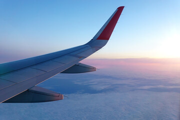 Fototapeta na wymiar Wing of an airplane. Travel tourism air transportation concept. Selective focus