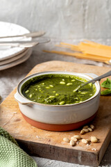 Pesto, sauce, and some ingredient, parmesan cheese, oil and nuts.