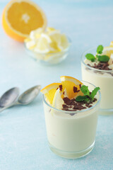 Orange lemon citrus milk mousse in glasses