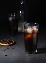 Cold coffee with ice in low key	