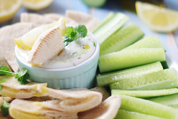 Tzatziki, Greek dip sauce with pita and cucumbers