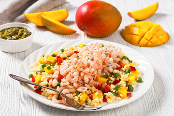 shrimps and millet pilaf with mango and veggies