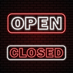 Obraz premium Open and closed neon signboards. Neon lettering into glowing frames on dark brick wall. Best for polygraphy, mobile apps and web design.
